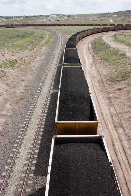 coal in railroad train hopper cars