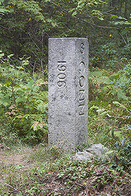 The MA/CT state line marker on the Mt Washington Road at the foot of Mts Bear and Frissell